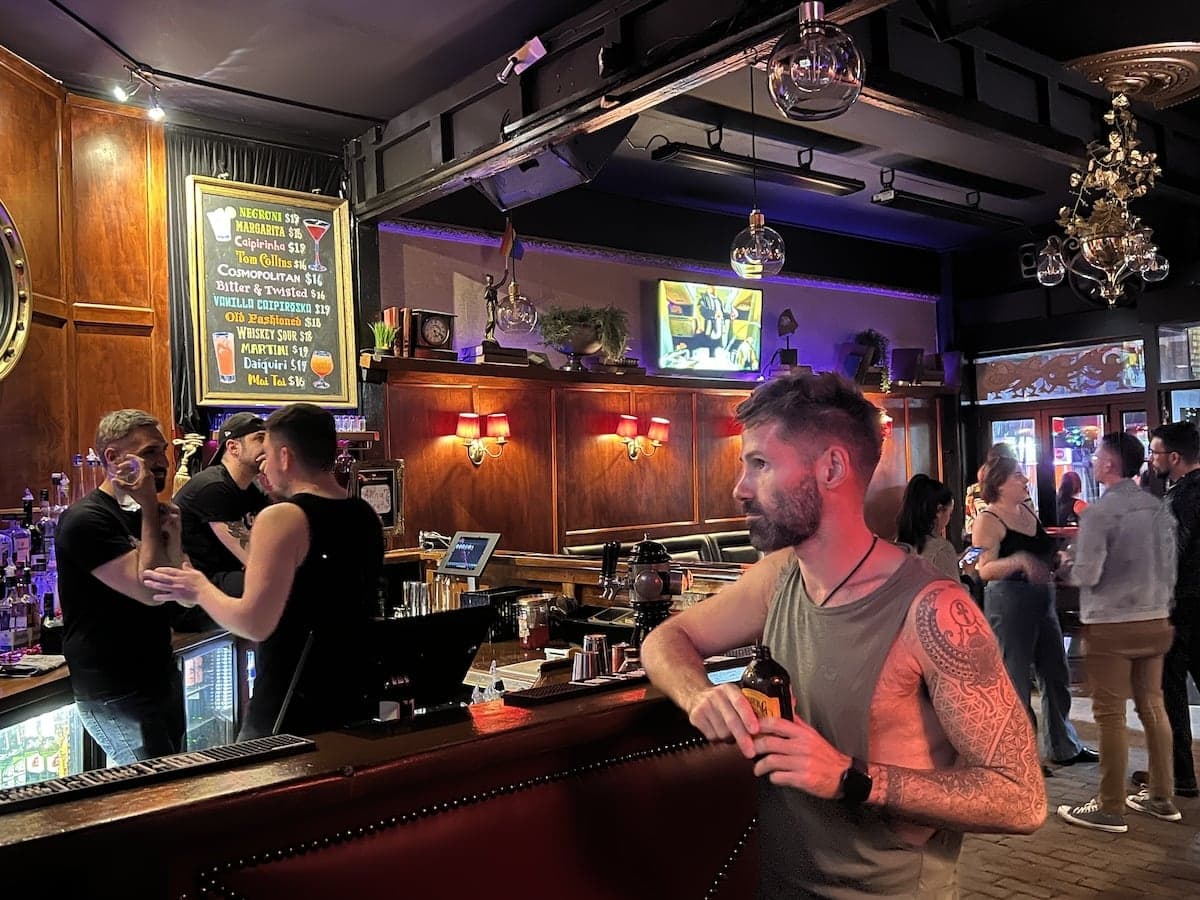 Seby having a drink at the Eagle gay bar in Auckland.
