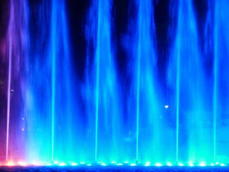 Blue fountain jets during the magic water fountain show in lima