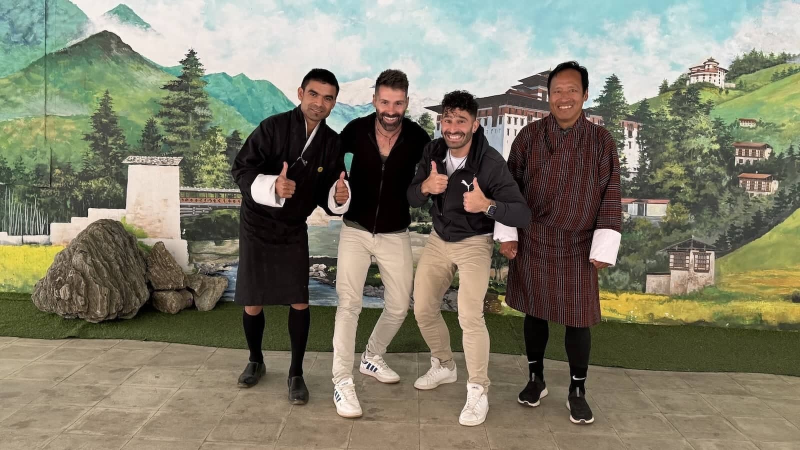 Stefan and Sebastien with Tula the guide and Karma the driver at Paro Airport.