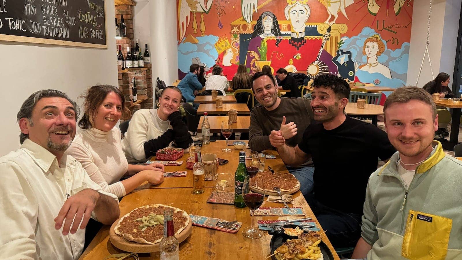 Yerevan Free Walking Tour group eating a meal in a restaurant in Yerevan.